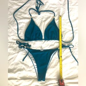 NWOT, SEXY bahama blue string bikini with rhinestone accents.